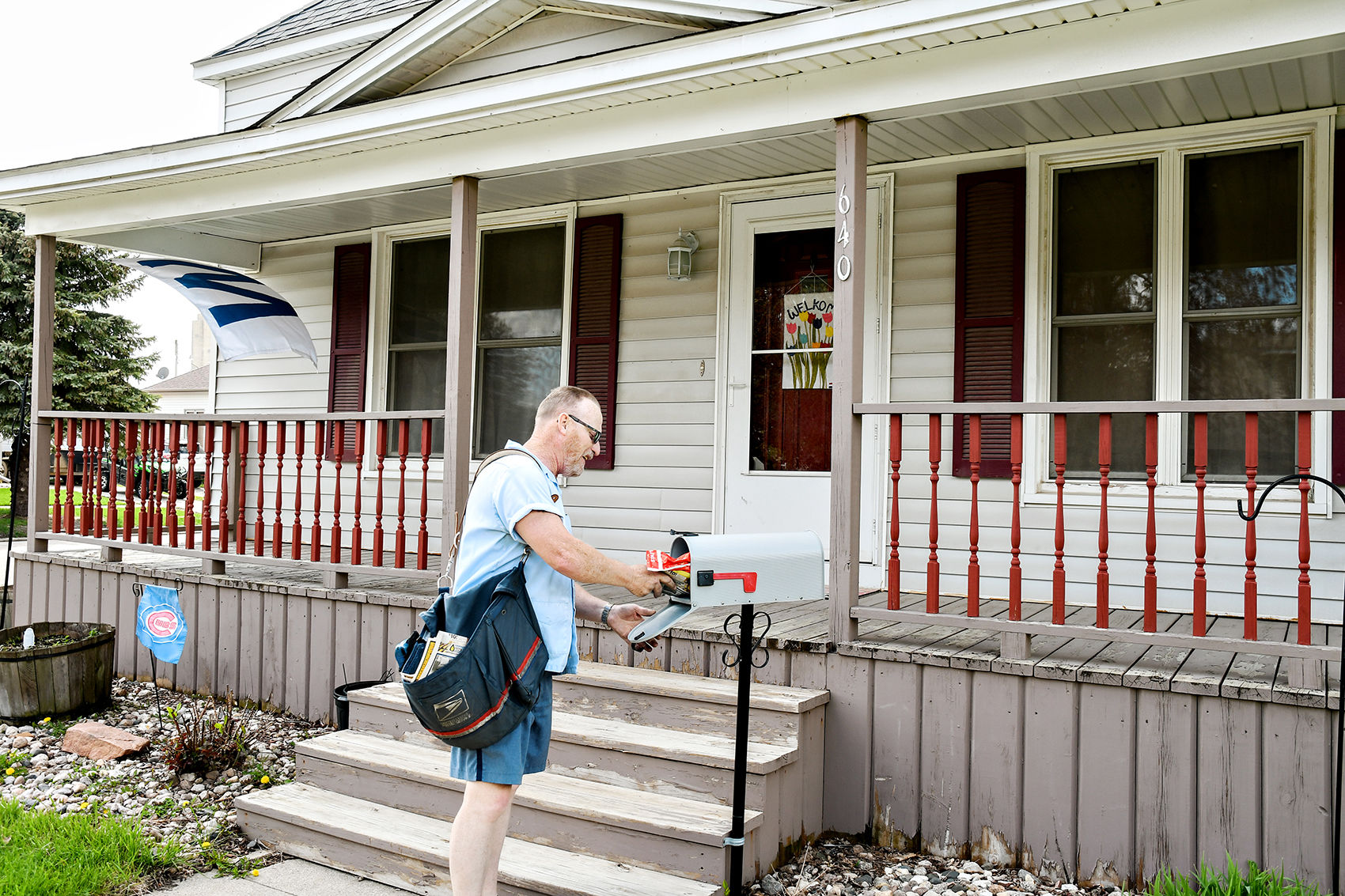 Postal carrier